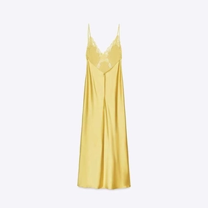 Elegant bright yellow satin midi dress with lace neckline and delicate spaghetti straps