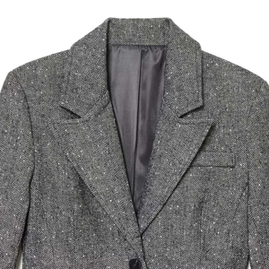 Formal grey herringbone blazer for women featuring classic lapels and high-quality wool texture
