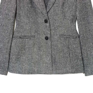 Gray herringbone blazer for women featuring notch lapel and classic double-button closure