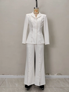White slim fit blazer set with silver metal studs on waist and split-leg pants