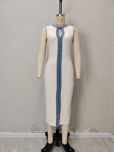 Slim-fit sleeveless knit dress in cream white with blue woven trim and V-neckline detail