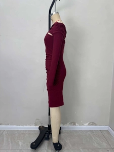 Detailed side profile of an elegant wine red ruched bodycon knit dress for women