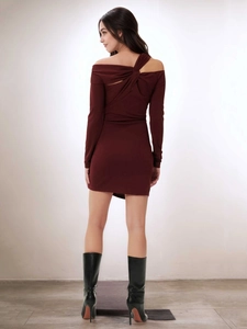 Back view detail of burgundy off-shoulder knit dress with twisted neckline and ruching