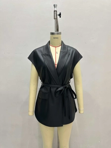 Fashionable faux leather sleeveless vest featuring a waist tie and notched lapel design