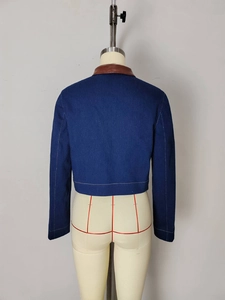 Dark blue cropped denim jacket with brown leather collar and white contrast stitching details