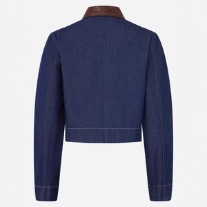 Back view of dark blue denim jacket with brown leather collar and high-quality stitching