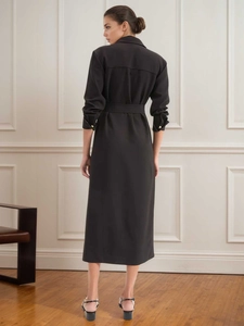 Elegant black long-sleeved shirt dress with waist tie and gold button detail back view