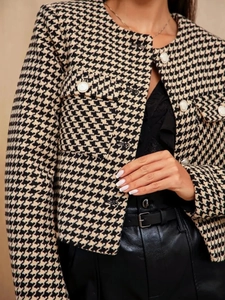 Classic houndstooth tweed jacket with round neck and elegant pearl buttons for women