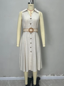 Detailed view of beige linen midi dress with button-front design and woven belt waist