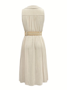 Back view of linen v-neck shirt dress featuring pleated details and woven straw belt
