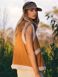 Vintage brown corduroy vest with sherpa lining and matching visor for autumn fashion