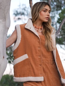Women's warm caramel corduroy vest with white faux shearling lining for autumn fashion