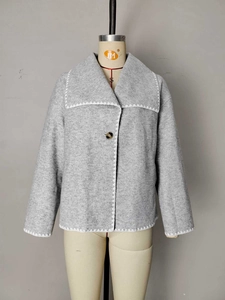Short grey wool jacket for women featuring contrast stitching and large lapel collar