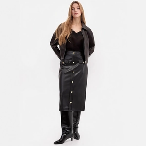 Detail of a black PU leather midi skirt with gold buttons and flap pocket design