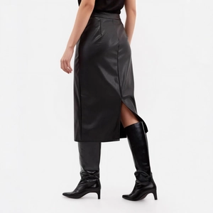 Detail view of high-waist black PU leather midi skirt featuring a sleek back slit design