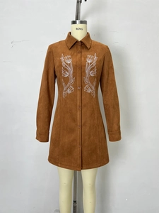 Brown faux suede shirt dress with long sleeves and white floral embroidery details