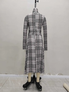 Plaid long sleeve turtleneck midi dress with waist pleats for a slim fit look