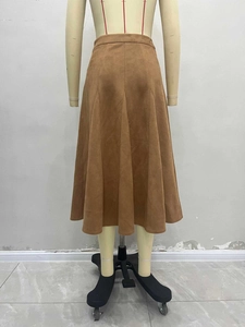 Classic A-line high waist faux suede midi skirt in camel brown featuring panelled design