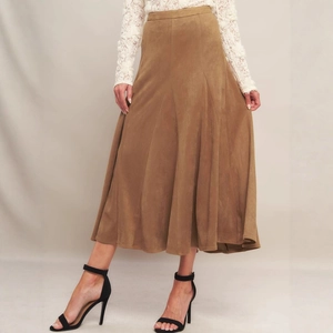 Detail view of caramel brown faux suede midi skirt with high waist and A-line cut
