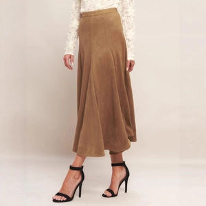 Detail of the elegant brown suede A-line midi skirt with high waist and smooth seamless texture
