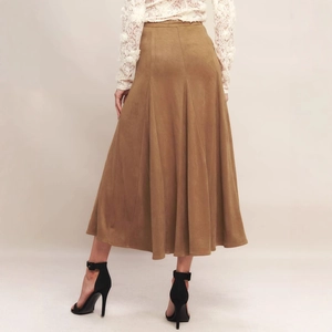 Rear view of brown suede midi skirt with elegant multi-panel stitching and A-line silhouette