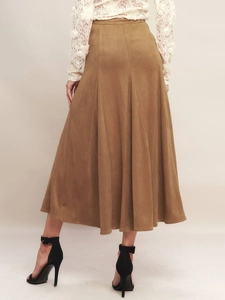 Back view of camel faux suede midi A-line skirt with elegant multi-panel stitching