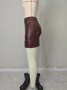 Side view of dark brown glossy PU leather high waist mini skirt on mannequin