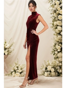 Elegant burgundy velvet sleeveless gown with high slit and gathered waist detail