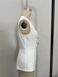 Detail view of white V-neck waistcoat featuring premium gold buttons and slim fit tailoring