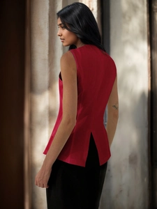 Detail view of the back split design on a red sleeveless vest for women with slim waist