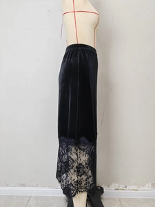 Elegant black velvet midi skirt with lace trim and high waist for a vintage look