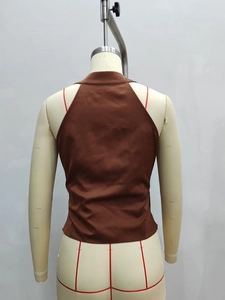 Brown satin halter neck backless top with chic side-tie detail on a studio mannequin