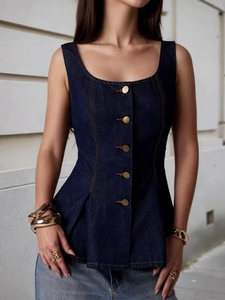 Slim fit dark blue denim vest with square neck and gold buttons on white building background