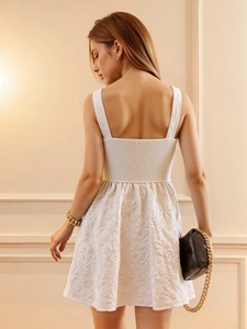 White French vintage mini dress with floral jacquard texture and smocked back design