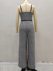 Elegant houndstooth wide-leg jumpsuit with thin straps and waist detail, back view