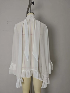 White sheer chiffon halter blouse with ruffled long sleeves and tie-neck detail
