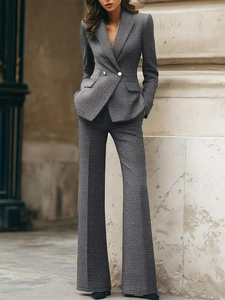 Gray tweed two-piece suit with double-breasted blazer and wide-leg trousers