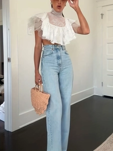 Lace ruffle high neck crop top in white paired with light blue high-waist straight jeans