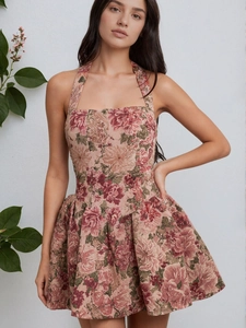 Retro floral halter mini dress with a fitted waist and elegant A-line silhouette style