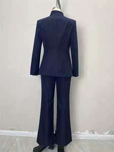 Navy blue slim fit women business suit back view featuring tailored blazer and trousers