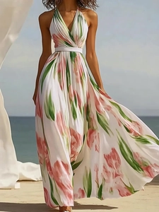 Detailed close-up of the V-neck pleated floral dress with pink tulip print on white fabric