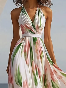Halter neck V-neck floral maxi dress with waist tie and flowy A-line summer silhouette