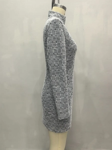 Side view of elegant tweed textured dress featuring a high neck and woven fabric detail