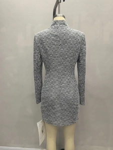 Detail of the back texture and hidden zipper on this elegant tweed mini dress