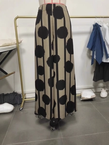 Women's high waist bohemian wide leg pants featuring khaki polka dot and stripe patterns