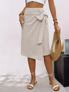 Women's beige wrap midi skirt with waist side bow tie for casual minimalist summer style