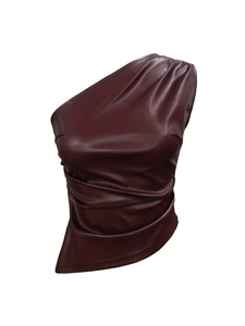 Detail of dark burgundy faux leather one-shoulder top featuring ruching and side zipper