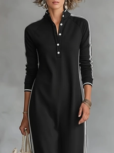 Minimalist black long sleeve hoodie dress with white side stripes and buttoned polo collar