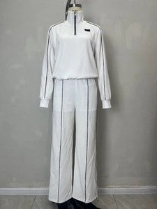Survêtement blanc côtelé pour femme avec haut à demi-zip et pantalon large fluide