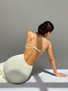 Elegant backless ivory white long dress with spaghetti straps and ruched detail